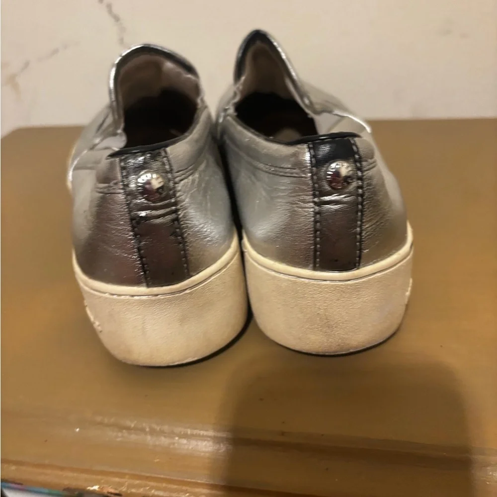 Michael Kors Silver Slip-On Shoes with Black Star Accents
